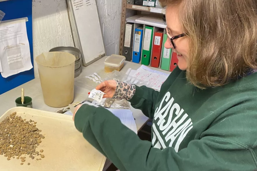 Hannah processing archaeological soil samples