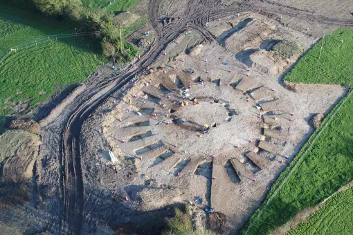 An aerial drone image of an excavated Neolithic barrow in Dorset.