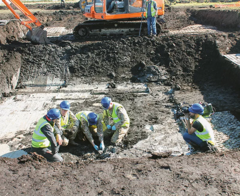 The OA team and Operation Nightingale veternas excavating the Spitfire